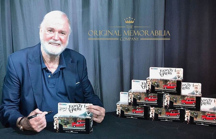 John Cleese signs Fawlty Towers Corgi Car